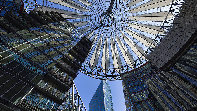 Glass dome with tent roof and skyscrapers of the Sony Center in Berlin, Germany