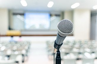 Microphone in conference room Photo of a microphone on a table