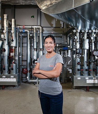 Photo of a STRABAG employee in the technical room